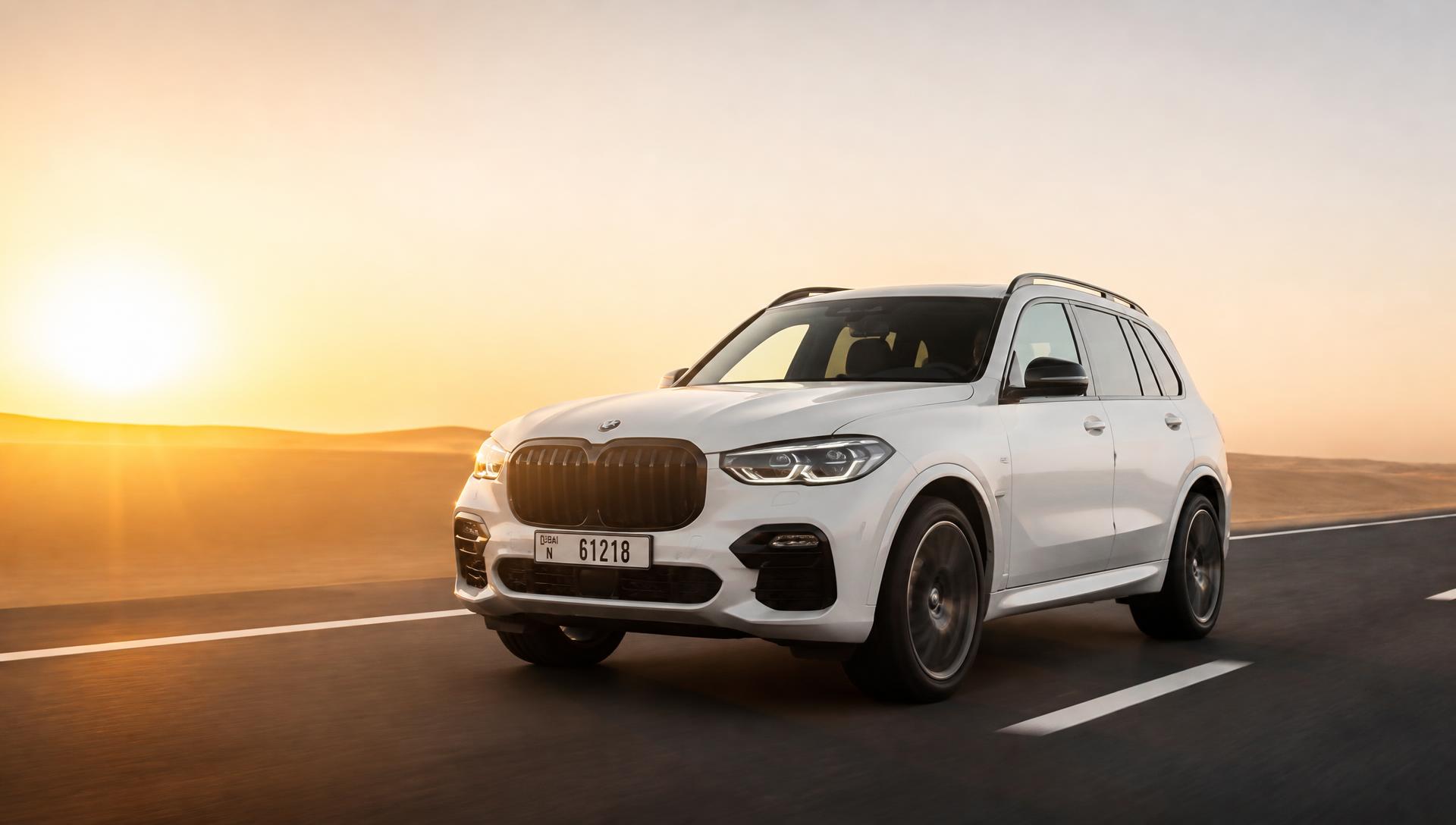 A premium SUV on a UAE highway at golden hour
